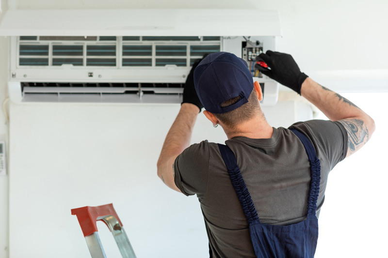 Heat pump being serviced